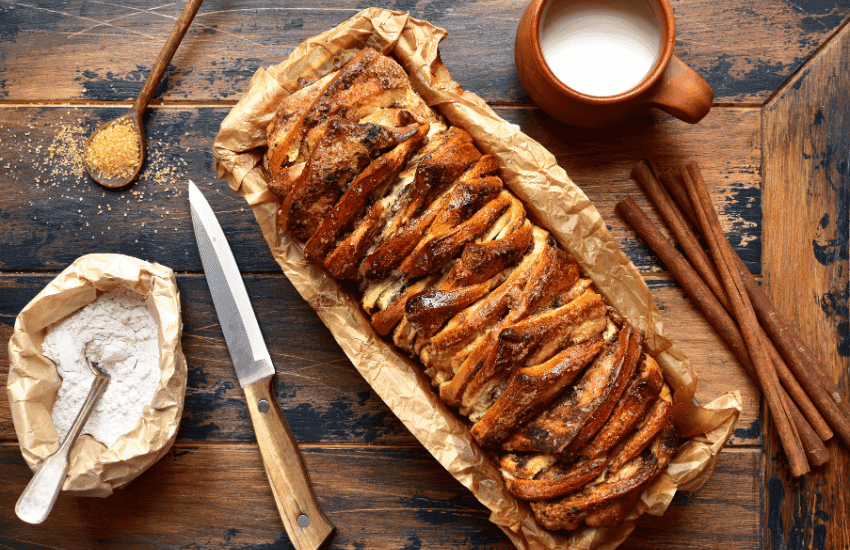 Freshly baked Cinnamon Roll Pull-Apart Toast with creamy icing