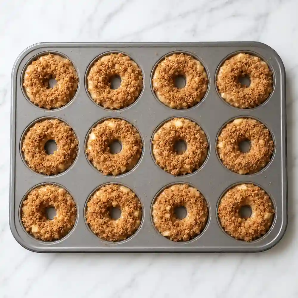 Apple Crumble Baked Donuts batter and crumble in donut pan
