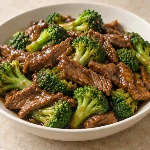 Beef and broccoli recipe with sliced beef, crisp-tender broccoli, and glossy brown sauce.